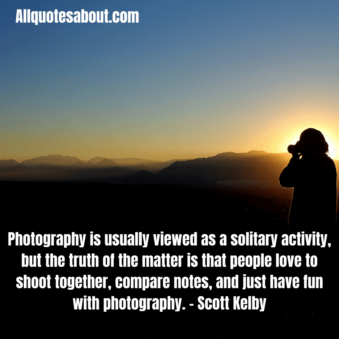 Wildlife photographer with telephoto lens